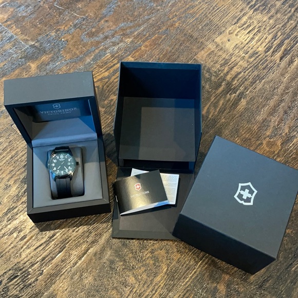 Swiss Army Accessories - Swiss Army Victorinox watch…. UNISEX … all Black!! Brand new in box. NEVER WORN!